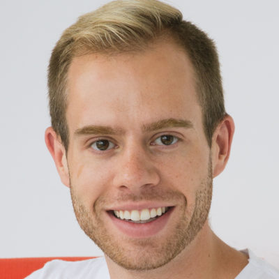A headshot of Brett Nielsen, a student from Cohort 15 at HackerYou