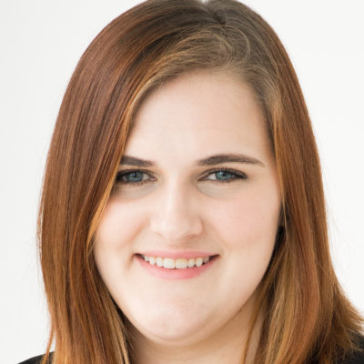 A headshot of Emma Kinch, a student from Cohort 15 at HackerYou