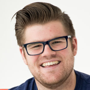 A headshot of Neil Morrison, a student from Cohort 15 at HackerYou